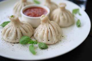 Ate Too Many Momos? Here Are 5 Easy Ways to Cleanse Your Stomach