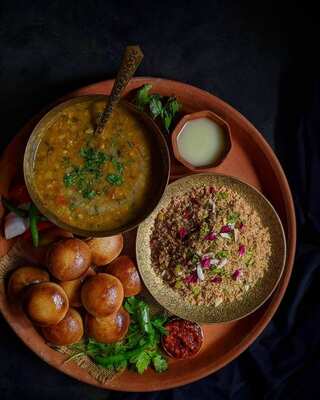 Cook Dal Baati Churma at Home: A Step-by-Step Recipe
